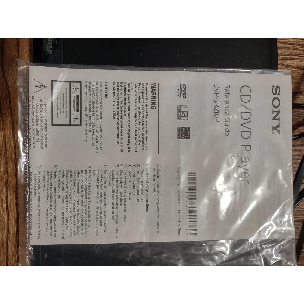 Sony DVP-SR210P Ultra Slim CD/DVD Player - Powers On / Ejects Includes Manual